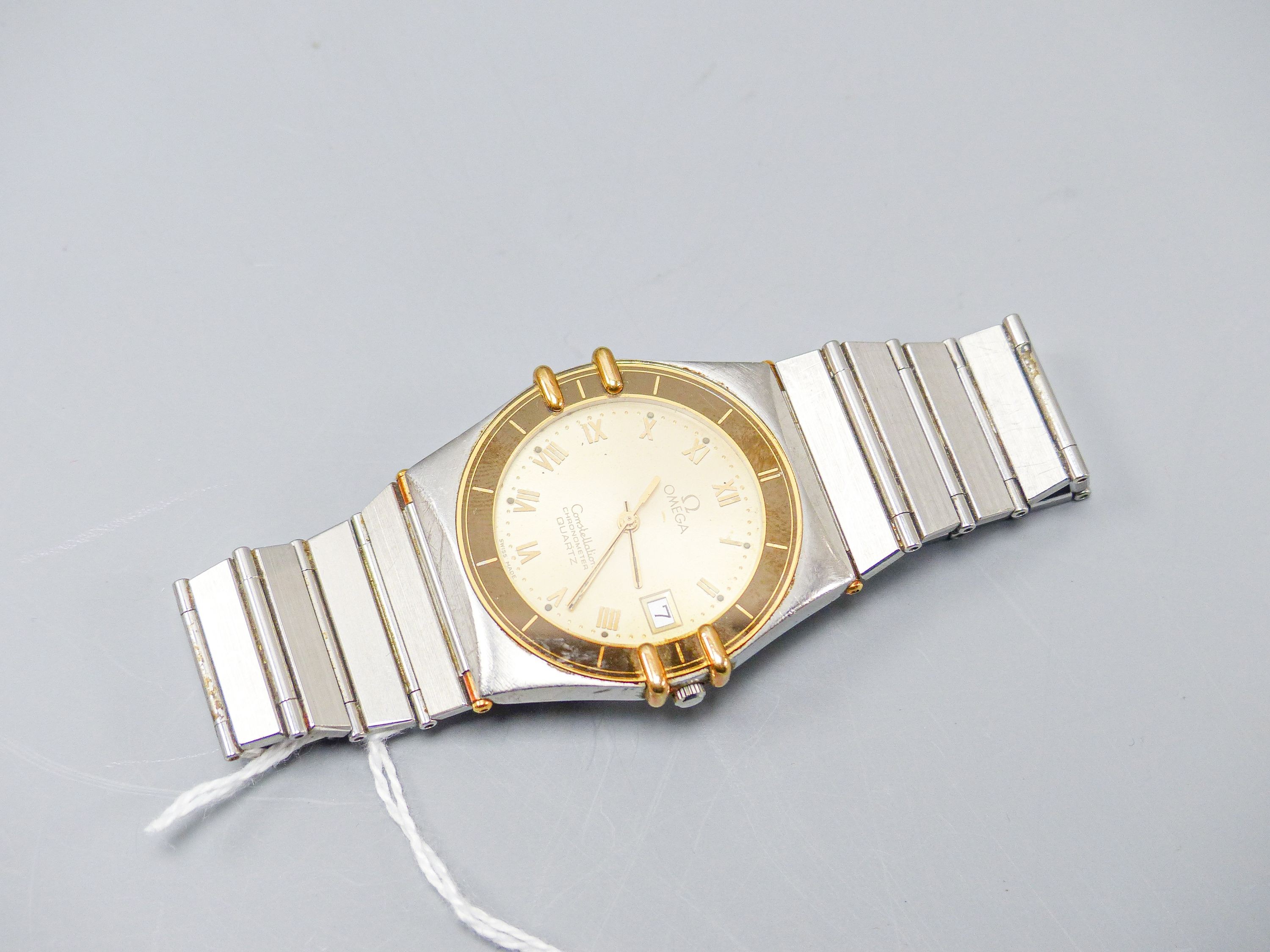 A gentleman's stainless steel Omega Constellation quartz wrist watch, case diameter 34mm, no box or papers.